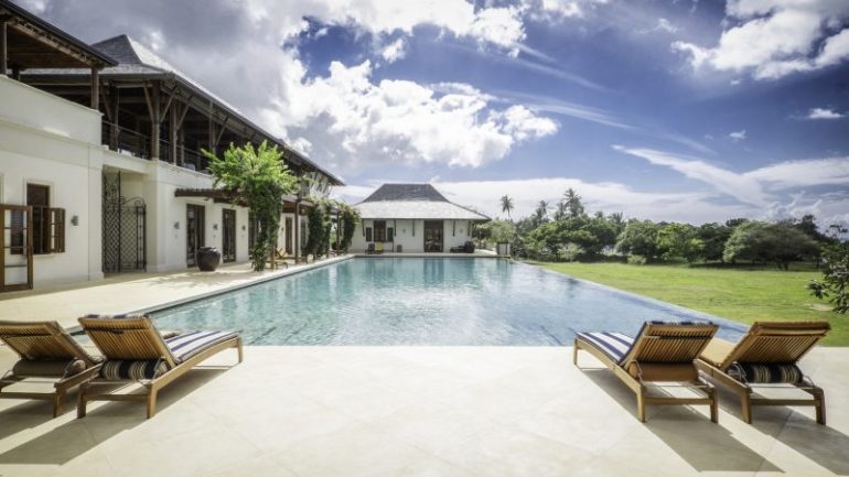 a luxury villa sits on an expansive 23 acre state